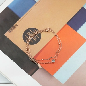 Double-layered rose gold titanium steel bracelet with sparkling crystal and lobster clasp