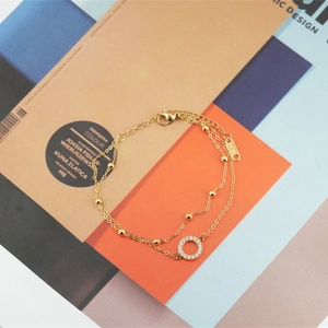 Bracelet élégant à plusieurs rangs en acier titane avec pendentif rond en strass chic