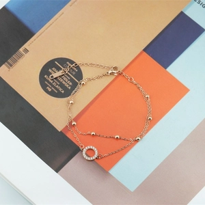 Bracelet élégant double couche en acier titane rose doré avec pendentif zircon