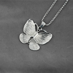 Vintage butterfly pendant necklace in polished titanium steel with classic box chain