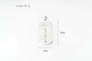 Macro detail of silver stainless steel dog tag necklace with 45mm height and 25mm width