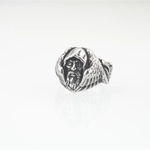 Retro gothic bearded deity ring with detailed wings and matte silver finish