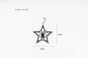 Macro view showing a stainless steel star pendant with a black gemstone and its dimensions