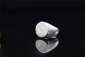 Polished silver signet ring featuring the Serenity Prayer and praying hands engraving