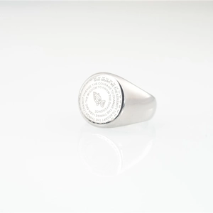 Silver signet ring with engraved serenity prayer text and praying hands design