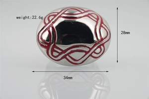 Macro detail of oval stainless steel ring with red enamel vortex patterns, 34mm size