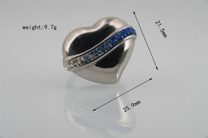 Detail view of heart ring showing 25.9mm width and blue gradient rhinestone inlay