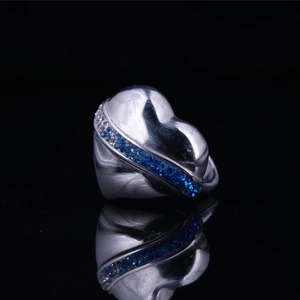Vintage heart shaped stainless steel ring with blue and white inlaid rhinestones