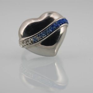 Vintage stainless steel heart ring with gradient blue crystals on a silver band