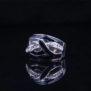 Elegant silver twisted stainless steel ring with black enamel and rows of small crystals