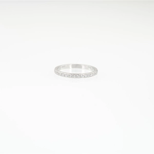 Classic silver stainless steel band ring featuring a minimalist row of sparkling zircons