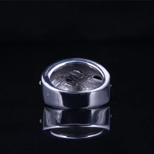 Elegant twisted titanium steel ring with a high polished silver finish and hollow design