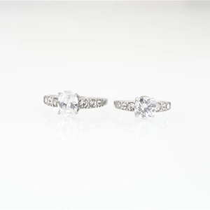 Classic Moissanite rings set with oval and round stones in polished silver settings