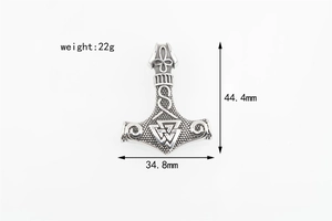 Detailed view of vintage Mjolnir pendant showing Celtic knots and precise measurements