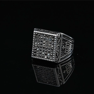 Vintage stainless steel ring with black square pavé diamonds and side crown relief