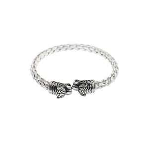 Vintage silver twisted steel bracelet featuring detailed double animal heads in a retro style