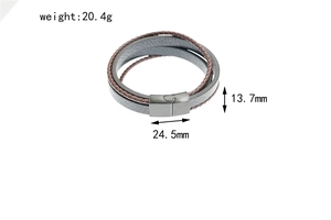 Macro shot of multi-layer leather bracelet with matte grey stainless steel magnetic clasp