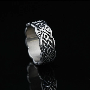Vintage silver Viking ring featuring Celtic knot patterns and a polished inner band