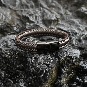 Men's braided leather bracelet with brown strands and black magnetic metal clasp