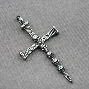 Retro punk gothic cross necklace with multiple skulls and deadly engraving in silver finish
