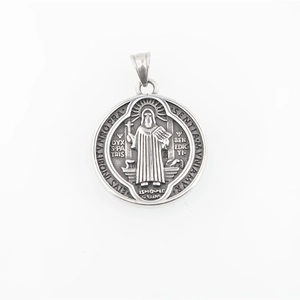 Vintage St. Benedict pendant in oxidized stainless steel with religious relief engraving