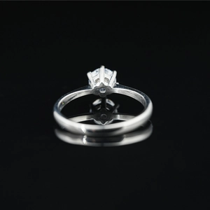Minimalist titanium steel ring with six-prong moissanite setting and polished finish