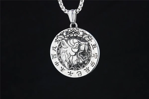 Close-up of silver tiger pendant necklace with Chinese zodiac characters and box chain