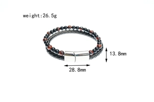 Detail showing red tiger eye beads and black braided leather strap with metal clasp