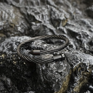 Industrial style twisted steel wire nail cuff bracelet in dark grey titanium finish