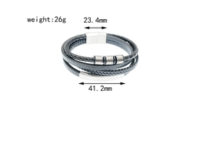 Detail view of multilayer black woven leather bracelet with metal beads and magnetic clasp