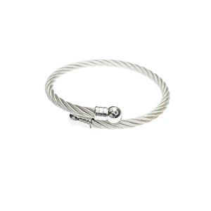 Minimalist stainless steel twisted cable bracelet with round beads on white background