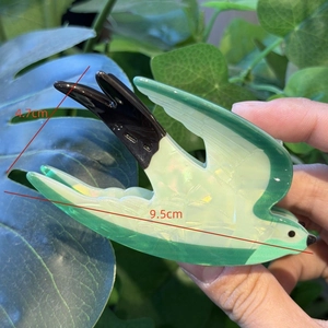 Realistic green swallow bird hair claw clip made of PVC acetate material for women