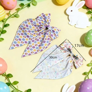Easter oversized bow hair clips featuring bunny and egg patterns for spring festive styling