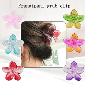 Set of colorful large frangipani hair claw clips in assorted vibrant floral colors