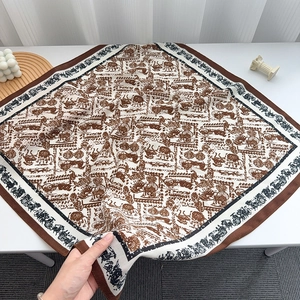 Detailed close-up of retro horse carriage pattern silk scarf showing light texture