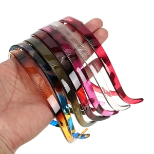 Set of 7 colorful non-slip U-shaped resin headbands with inner grip teeth for women