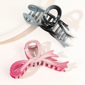 Pince à cheveux 12cm avec nœud dégradé en gris et rose avec une finition brillante