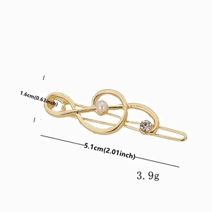 Elegante fermaglio per capelli a nota musicale dorata con perla e strass, 5,1 cm