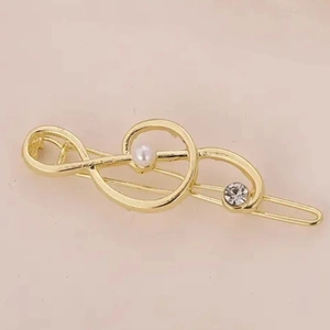 Fermaglio per capelli a nota musicale dorato con perla sintetica e strass lucido