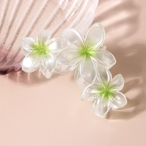 Pince à cheveux fleur de frangipanier nacrée 9cm blanc et vert pour look estival