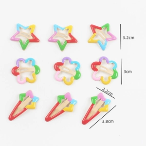 Set of colorful rainbow star and flower metal snap hair clips in assorted sizes