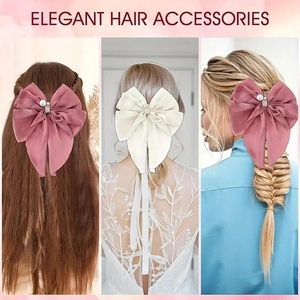 Elegant oversized satin bow hair clip with pearls and rhinestones in pink and cream