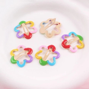Five-piece set of colorful hollow flower hair clips in vibrant candy paint finishes