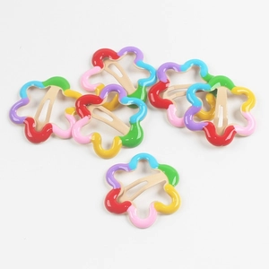 Set of seven colorful flower-shaped BB hair clips with vibrant enamel finish for girls