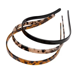 Three-piece set of narrow acetate hairbands in black and tortoise shell patterns