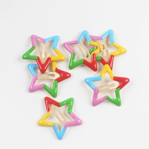 Detail of colorful star snap hair clips featuring vibrant multi-color epoxy metal finish
