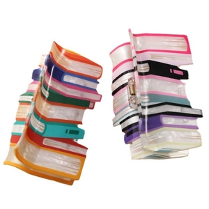 Pair of creative book-shaped acrylic hair claws with colorful layered book design