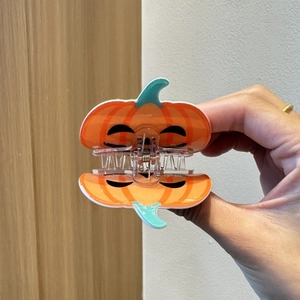Cute cartoon pumpkin shark hair claw clip in orange for Halloween hair styling