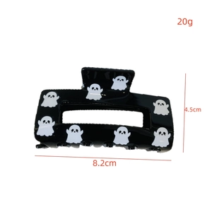 Ghost print hair claw clip dimensions measuring 8.2cm long and 4.5cm high in black