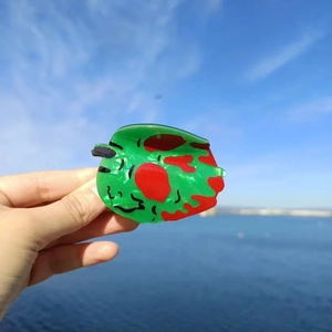 Funny caterpillar shaped green acetate hair claw clip with red dots for women